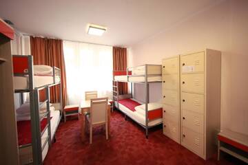 Фото номера Односпальная кровать в общем номере с 10 кроватями Хостелы eMKa Hostel г. Варшава 4