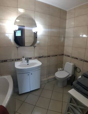 Фото номера Апартаменты с 1 спальней (для 4 взрослых) Апартаменты Apartament Łucka г. Варшава 16