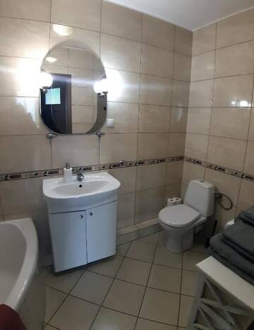 Фото номера Апартаменты с 1 спальней (для 4 взрослых) Апартаменты Apartament Łucka г. Варшава 64