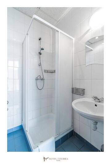 Фото номера Двухместный номер с 2 отдельными кроватями Отель Hotel Colibra г. Варшава 7