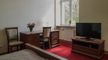 Фото номера Улучшенный двухместный номер с 1 кроватью Отель Hotel Łazienkowski г. Варшава 3