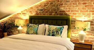 Фото номера Двухместный номер Делюкс в мансарде Апартаменты SleepWell Apartments Nowy Świat г. Варшава 8