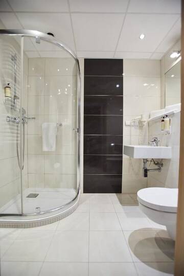 Фото номера Стандартный двухместный номер с 2 отдельными кроватями Отель Arche Hotel Puławska Residence г. Варшава 6