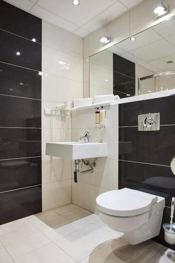 Фото номера Стандартный двухместный номер с 2 отдельными кроватями Отель Arche Hotel Puławska Residence г. Варшава 14
