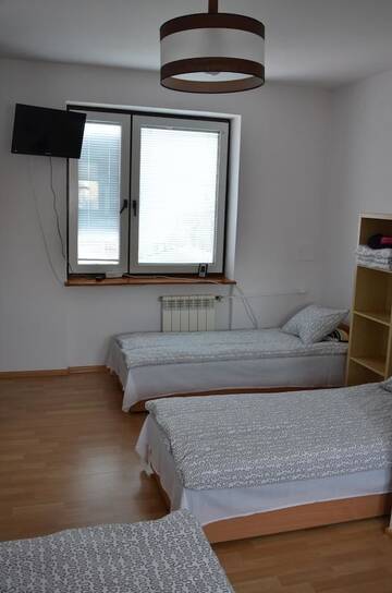 Фото номера Апартаменты с 4 спальнями Апартаменты Apartament Tolek г. Варшава 8
