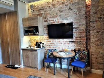 Фото номера Улучшенный номер-студио Апартаменты SleepWell Apartments Ordynacka г. Варшава 2