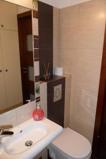Фото номера Улучшенные апартаменты - Grzybowska Street, 30 Апартаменты Downtown Apartment г. Варшава 7