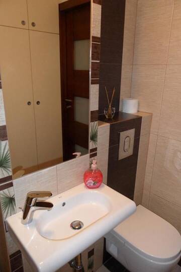 Фото номера Улучшенные апартаменты - Grzybowska Street, 30 Апартаменты Downtown Apartment г. Варшава 6