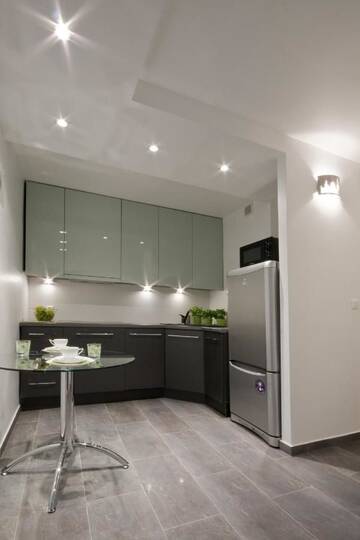 Фото номера Улучшенные апартаменты Апартаменты Apartament Świętokrzyska г. Варшава 16