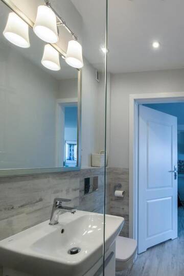 Фото номера Апартаменты Делюкс с балконом Апартаменты Apartament Świętokrzyska г. Варшава 21