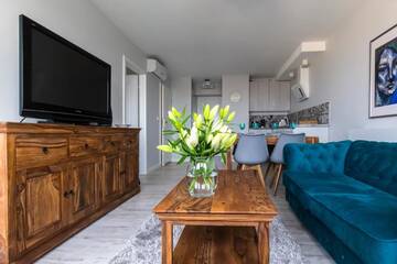 Фото номера Апартаменты Делюкс с балконом Апартаменты Apartament Świętokrzyska г. Варшава 4