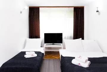 Фото номера Номер-студио (для 3 взрослых) Апартаменты Hosapartments City Center г. Варшава 11