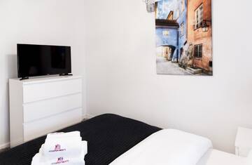 Фото номера Апартаменты с балконом Апартаменты Hosapartments City Center г. Варшава 6