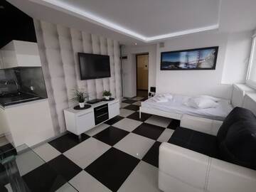 Фото номера Улучшенный номер-студио с балконом Апартаменты bonApartments г. Варшава 2