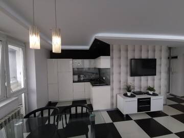 Фото номера Улучшенный номер-студио с балконом Апартаменты bonApartments г. Варшава 4