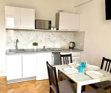 Фото номера Апартаменты с 3 спальнями Апартаменты Center Warsaw - Apartmenty Jana Pawła II г. Варшава 69