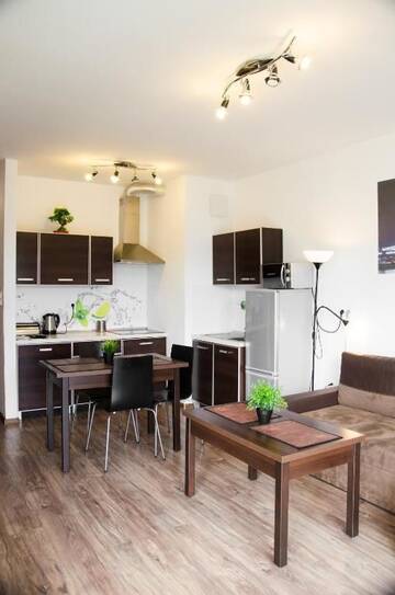 Фото номера Апартаменты с 1 спальней Апартаменты Apartament Centrum Giełdowa г. Варшава 60