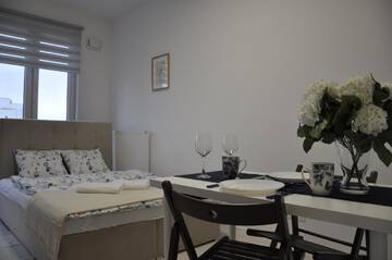 Фото номера Двухместный номер Делюкс с 1 кроватью и душем Апартаменты Prudentia Apartments Kłobucka г. Варшава 10