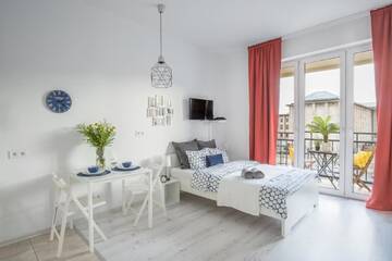 Фото номера Номер-студио с балконом Апартаменты Palm Aparts Warsaw г. Варшава 3