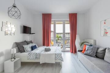 Фото номера Номер-студио с балконом Апартаменты Palm Aparts Warsaw г. Варшава 2