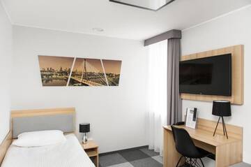 Фото номера Просторный одноместный номер Отель Waw Hotel Airport Okęcie г. Варшава 10