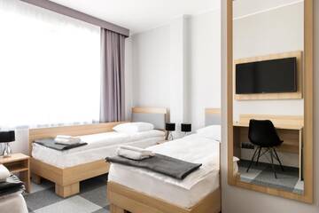 Фото номера Трехместный номер Отель Waw Hotel Airport Okęcie г. Варшава 3