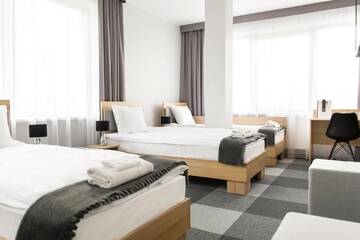 Фото номера Трехместный номер Отель Waw Hotel Airport Okęcie г. Варшава 2