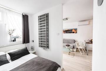 Фото номера Апартаменты с 1 спальней Апартаменты Alma Apartments Grzybowska г. Варшава 33
