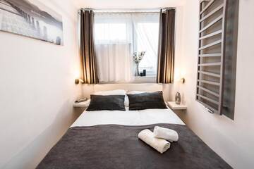 Фото номера Апартаменты с 1 спальней Апартаменты Alma Apartments Grzybowska г. Варшава 10