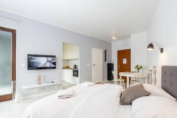 Фото номера Номер-студио Делюкс с кроватью размера &quot;queen-size&quot; Апартаменты Kazou Service г. Варшава 8