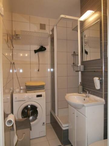 Фото номера Апартаменты с балконом Апартаменты Alma Apartments г. Варшава 13