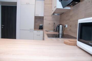 Фото номера Апартаменты Апартаменты Apartament Obrzeżna 3 Deluxe г. Варшава 11
