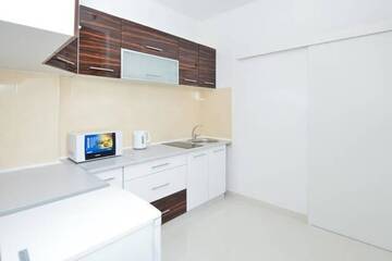 Фото номера Улучшенный номер-студио с балконом Апартаменты Center Warsaw- Apartamenty Smolna г. Варшава 8