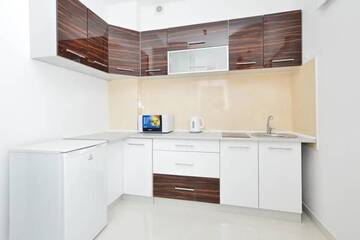 Фото номера Улучшенный номер-студио с балконом Апартаменты Center Warsaw- Apartamenty Smolna г. Варшава 7