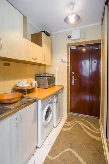 Фото номера Апартаменты Апартаменты Wspólna Apartment г. Варшава 9