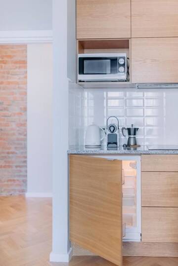 Фото номера Апартаменты с 2 спальнями Апартаменты APARTEL Plac Unii Lubelskiej г. Варшава 51