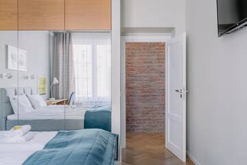 Фото номера Апартаменты с 2 спальнями Апартаменты APARTEL Plac Unii Lubelskiej г. Варшава 68