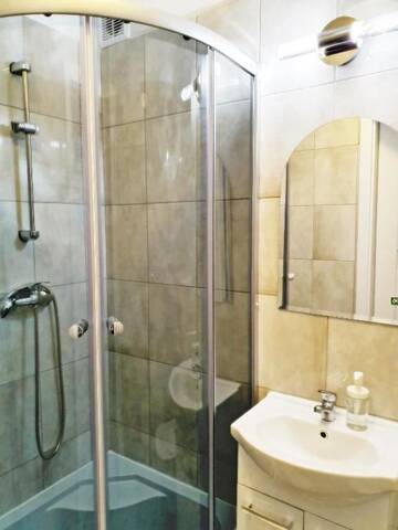 Фото номера Апартаменты с 1 спальней Апартаменты Coser Apartamenty Centrum 1 г. Варшава 6