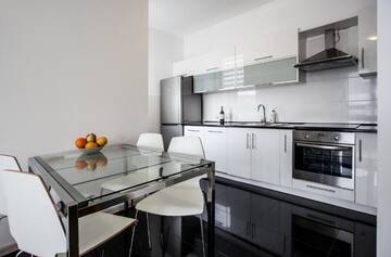 Фото номера Апартаменты (для 2-4 взрослых) Апартаменты Executive Suites Galeria Park г. Варшава 17