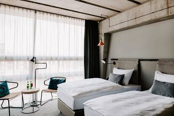Фото номера Двухместный номер с 2 отдельными кроватями Отель Vienna House Mokotow Warsaw г. Варшава 3