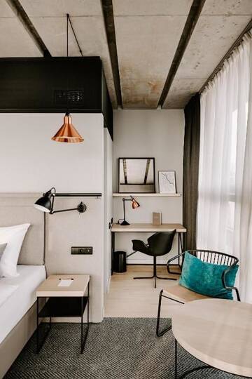 Фото номера Двухместный номер с 2 отдельными кроватями Отель Vienna House Mokotow Warsaw г. Варшава 8