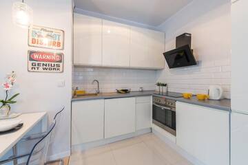 Фото номера Двухместный номер-студио Делюкс с 1 кроватью Апартаменты P&amp;O Apartments Komfort Apartament - Mokotów г. Варшава 70