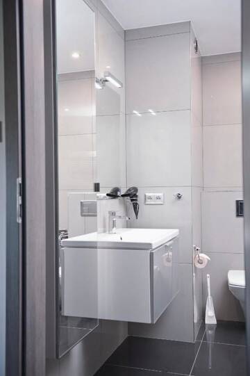 Фото номера Апартаменты с гидромассажной ванной Апартаменты Apartamenty Nad Jeziorkiem г. Варшава 15