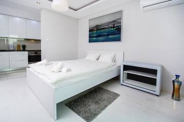 Фото номера Двухместный номер-студио Делюкс с 1 кроватью Апартаменты erApartments Wronia Oxygen г. Варшава 4