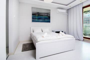Фото номера Двухместный номер-студио Делюкс с 1 кроватью Апартаменты erApartments Wronia Oxygen г. Варшава 2