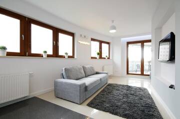 Фото номера Номер-студио Делюкс с балконом Апартаменты erApartments Wronia Oxygen г. Варшава 2