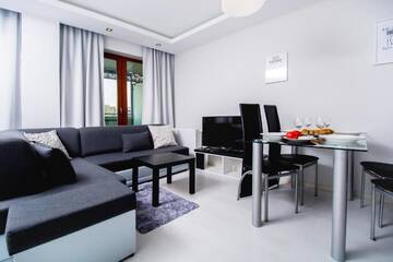 Фото номера Двухместный номер-студио Делюкс с 1 кроватью Апартаменты erApartments Wronia Oxygen г. Варшава 9