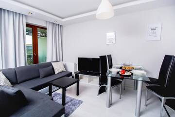 Фото номера Двухместный номер-студио Делюкс с 1 кроватью Апартаменты erApartments Wronia Oxygen г. Варшава 10