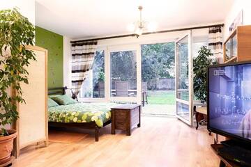 Фото номера Апартаменты с террасой Апартаменты Lovely Garden Flat near Royal Park г. Варшава 30