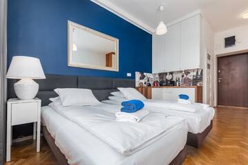 Фото номера Стандартный трехместный номер-студио Апартаменты Smolna Apartments by Your Freedom г. Варшава 21